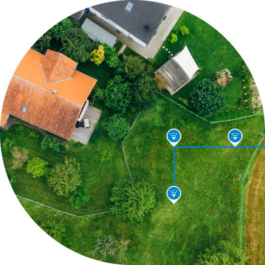 Overhead shot of a mapped property with GPS pins